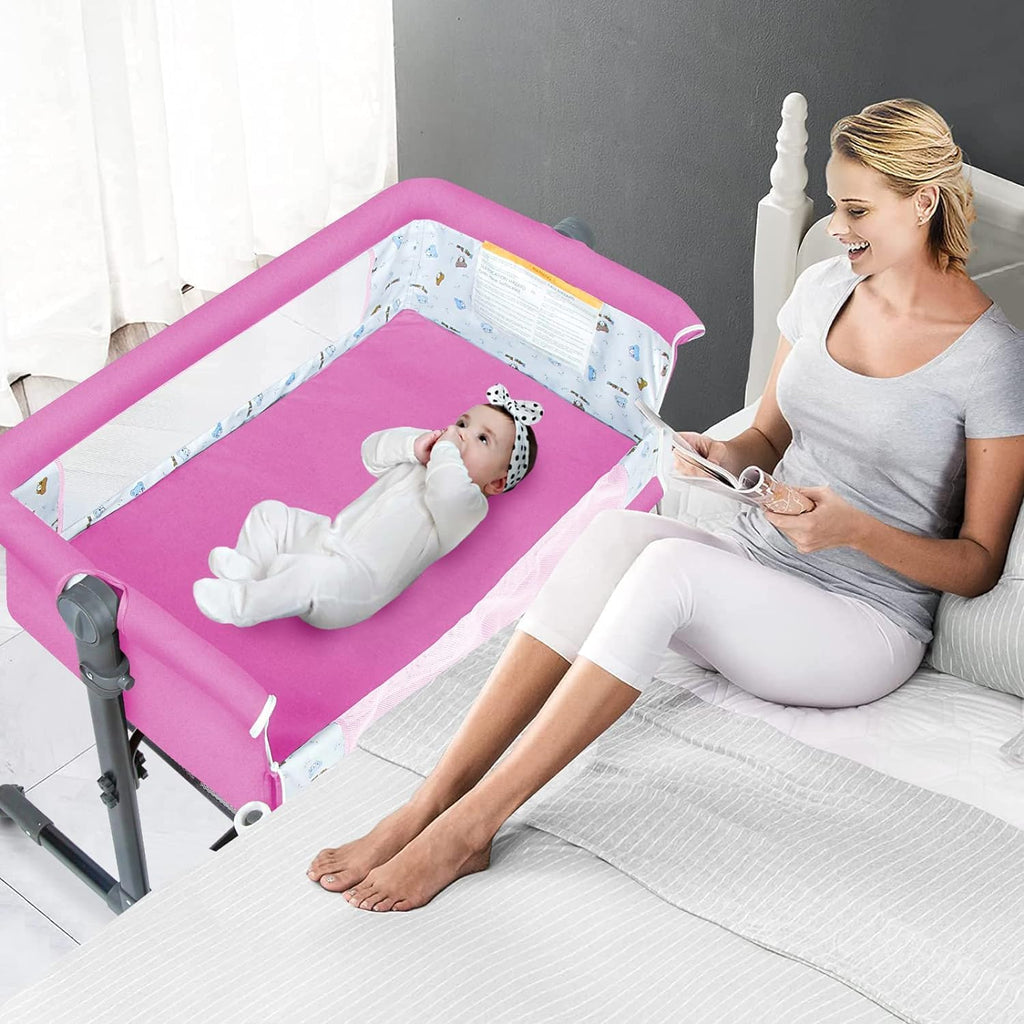 Bedside Crib for Baby, Bassinet Sleeper with Wheels, Height Adjustable, Tilts & Rocks, with Mosquito Nets, Large Storage Bag, for Infant/Baby/Newborn (Pink)